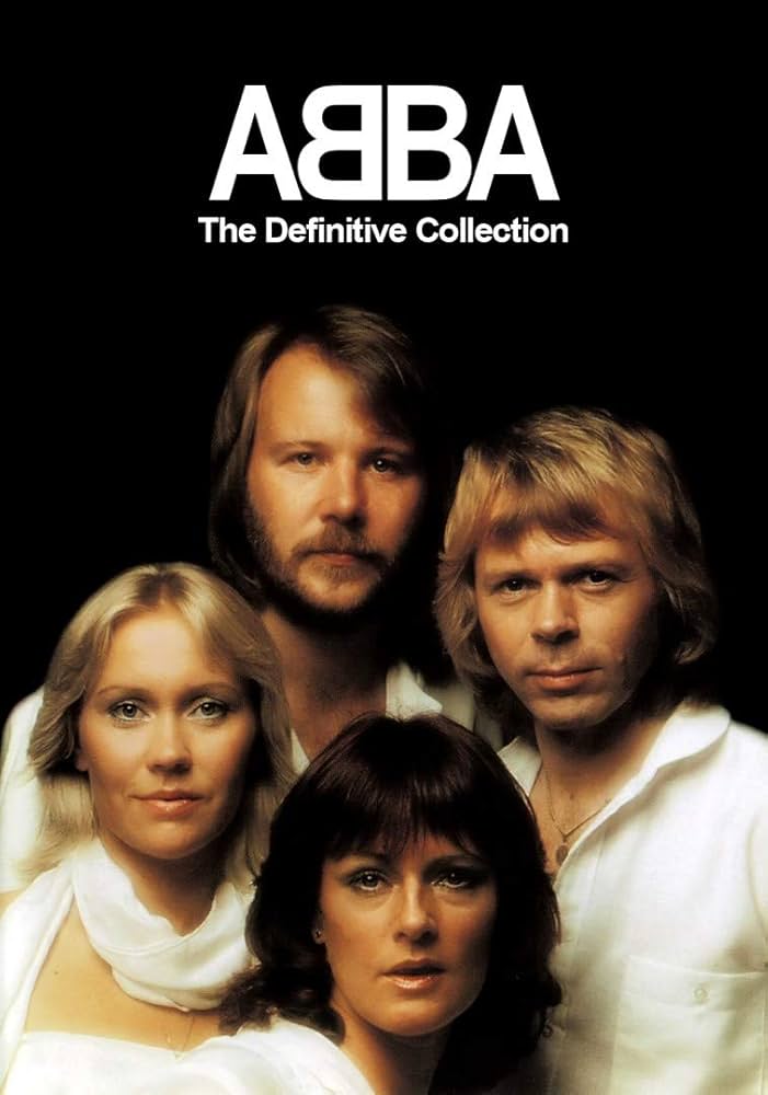 Cover of 'ABBA: The Definitive Collection' featuring the Swedish pop group in white outfits against a black background. This compilation album showcases their greatest hits, including 'Dancing Queen' and 'Mamma Mia.'