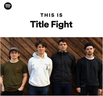 Spotify's 'This Is Title Fight' playlist cover featuring a photo of the four members of the band Title Fight standing side by side in front of a wooden plank wall. They are dressed casually in hoodies, t-shirts, and beanies, with neutral expressions. The Spotify logo appears in the top left corner, and the text 'THIS IS Title Fight' is centered above the image.